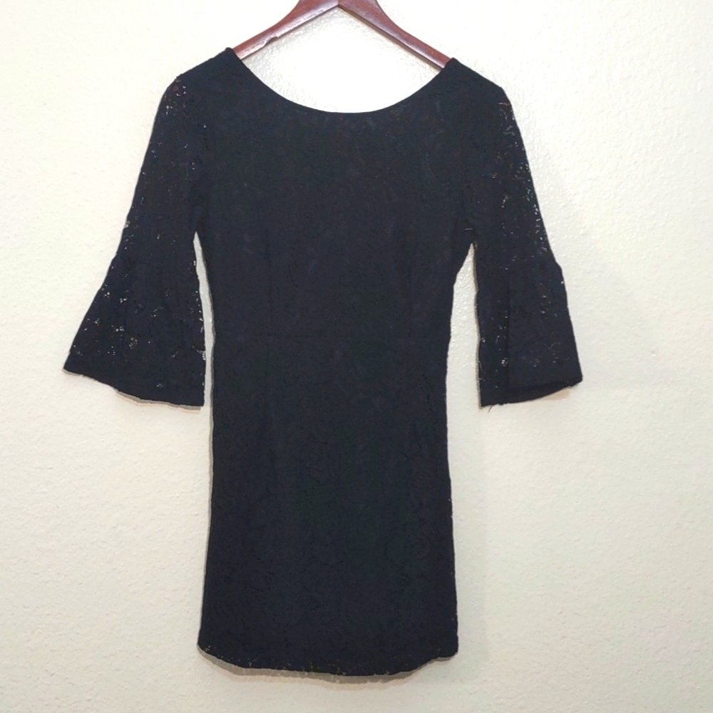 SLIGHTLY USED AZUKI DRESS SIZE S COLOR BLACK HAS BELL SLEEVE